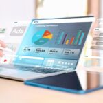 Using AI for Marketing Analytics dashboard displayed on laptop with data charts, ads performance metrics, and predictive insights interface.